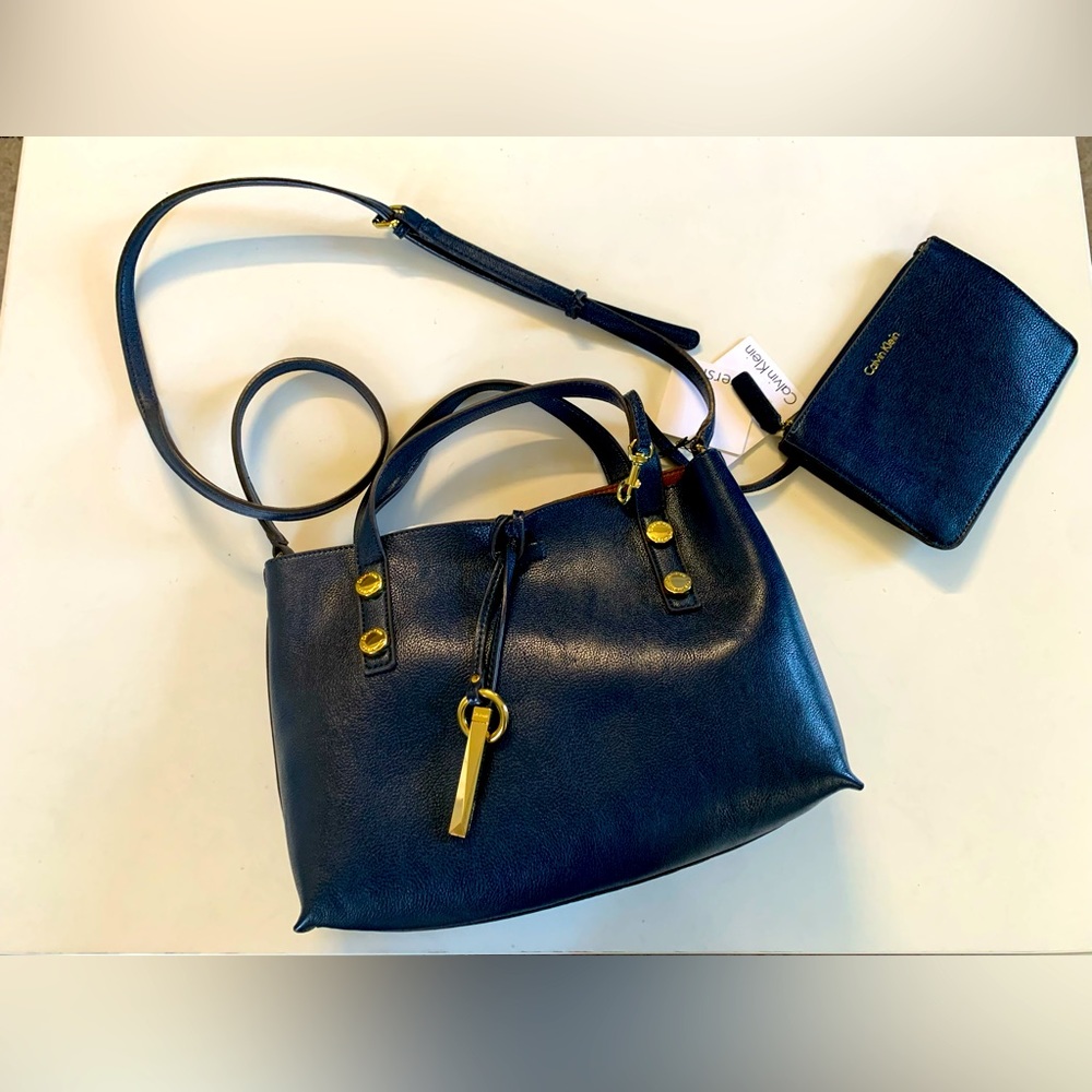 Calvin Klein reversible navy blue bag. Brand new with tag!